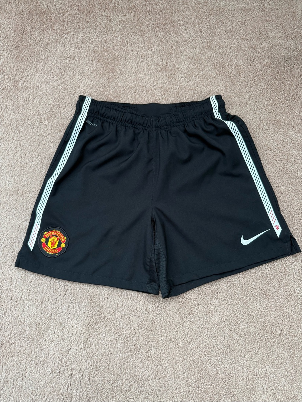 Nike Black Men's Athletic Shorts with White Accents and Manchester United Crest